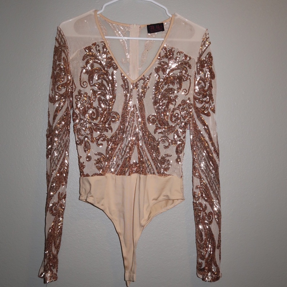 Sequin and sheer top with V neck